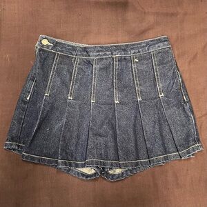 J. Galt Brandy Melleville 
Mini denim pleated skort with white stitching